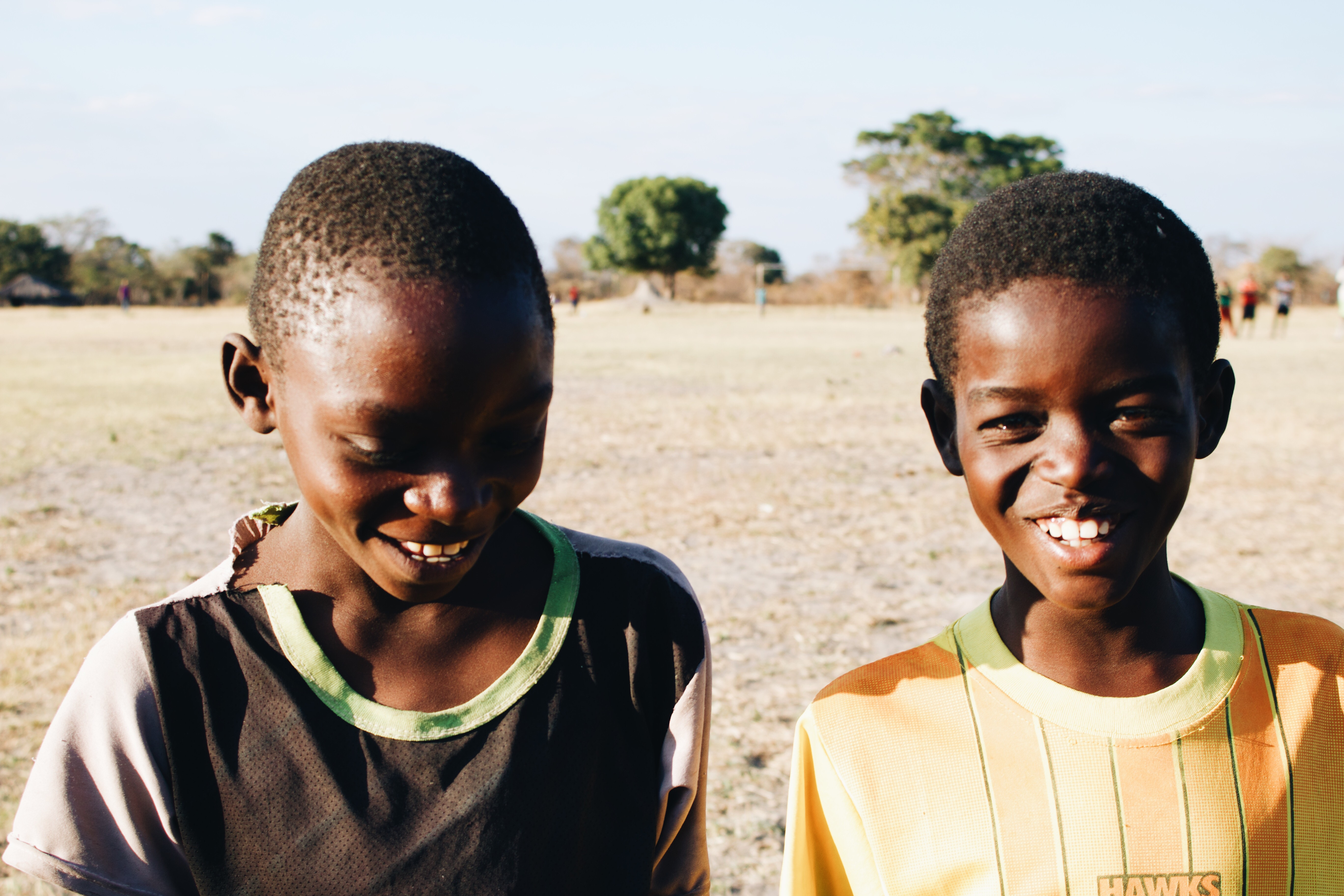 Two children laughing, Bombwe, Zambia