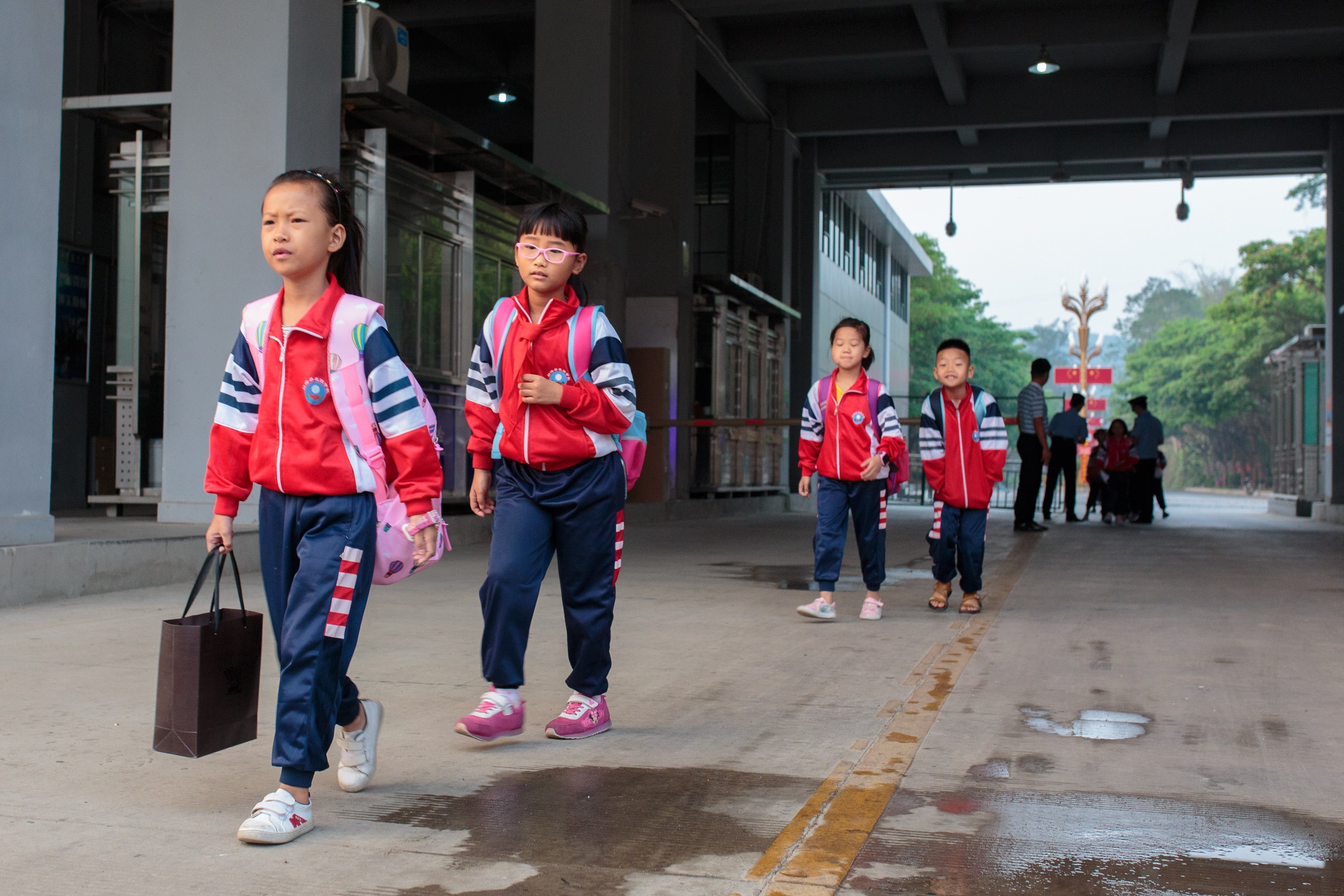 Children from Myanmar cross the border each day to attend the Friendship Primary School in Daluo township in Meng Hai County, China. 