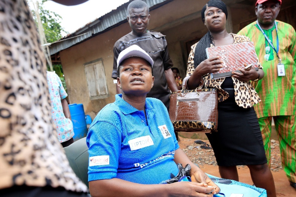 Health worker Mercy Nkiruka Agbo educates expectant mothers and their family about preventive malaria therapy and the importance of receiving antenatal care (Nigeria)