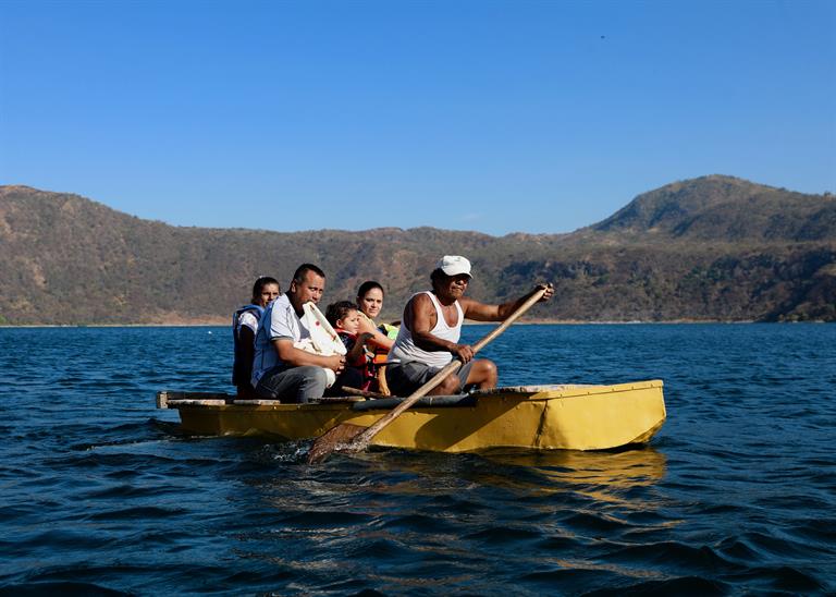 A group of people on a boat on Lagoon Xiloa, in Nicaragua