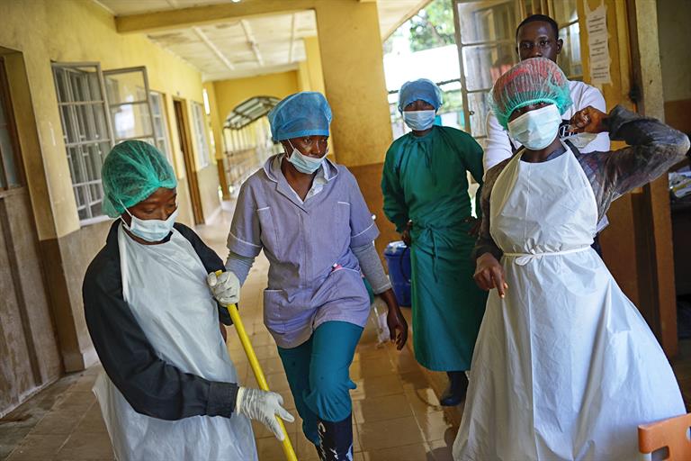 sierra leone ebola health workers Nurses ensure hygiene standards are met at Makeni regional hospital in Sierra Leone
