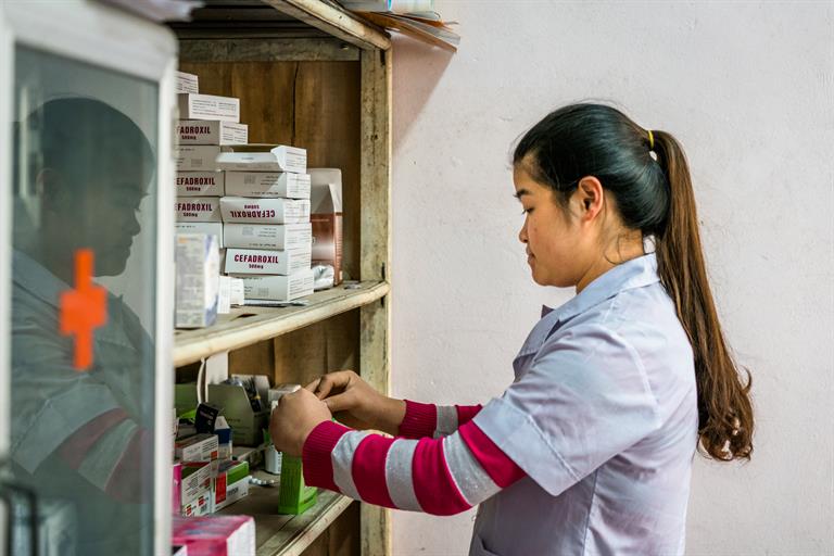 viet name diabetes nurse pharmacy medicines A nurse checks the medicine in a small pharmacy at a rural commune health center in Doi Son, Ha Nam Province, Vietnam.