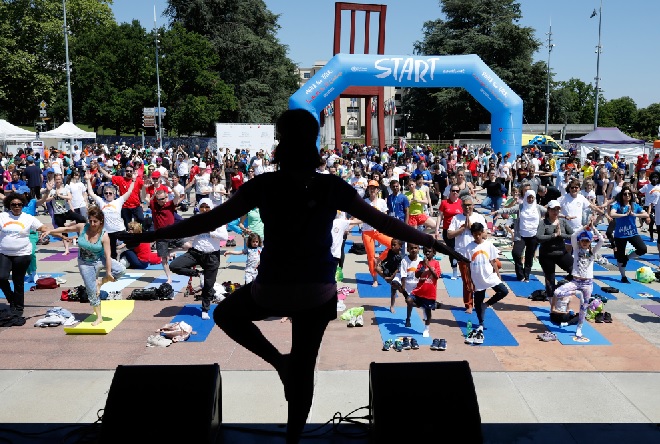 People doing Yoga in a square