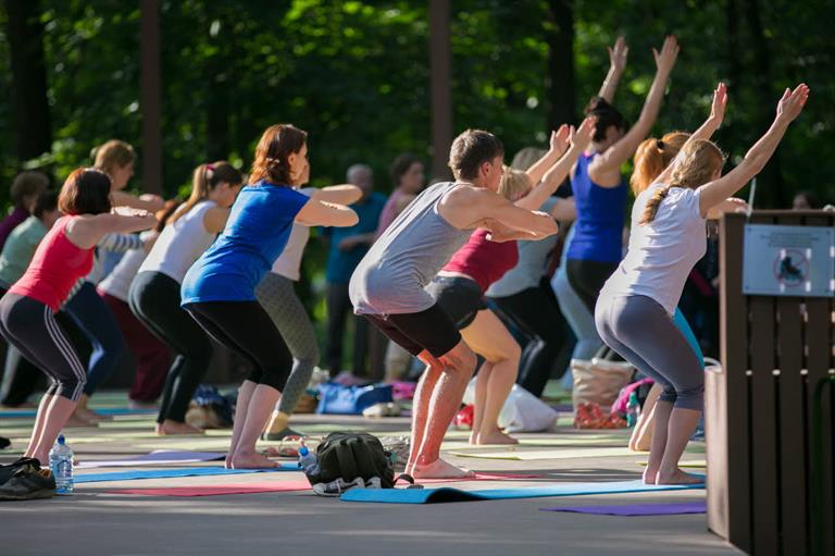 yoga russia People in a park doing yoga