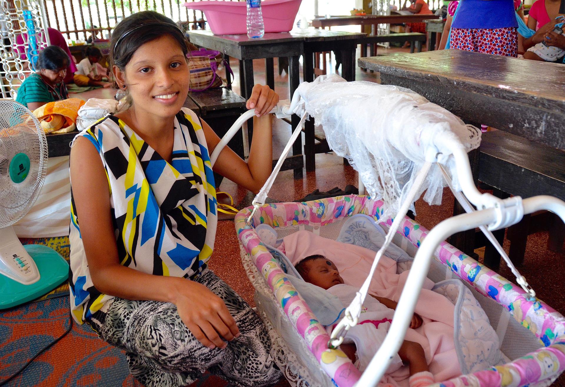 Achini Mekala with her newborn child