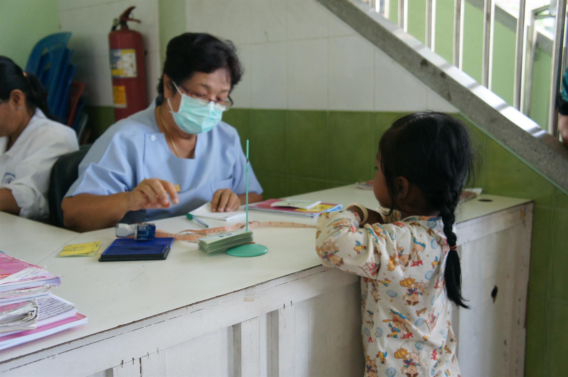 Child with registered nurse