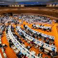 Aerial view of committee discussions on the closing day of the Seventy-first World Health Assembly.